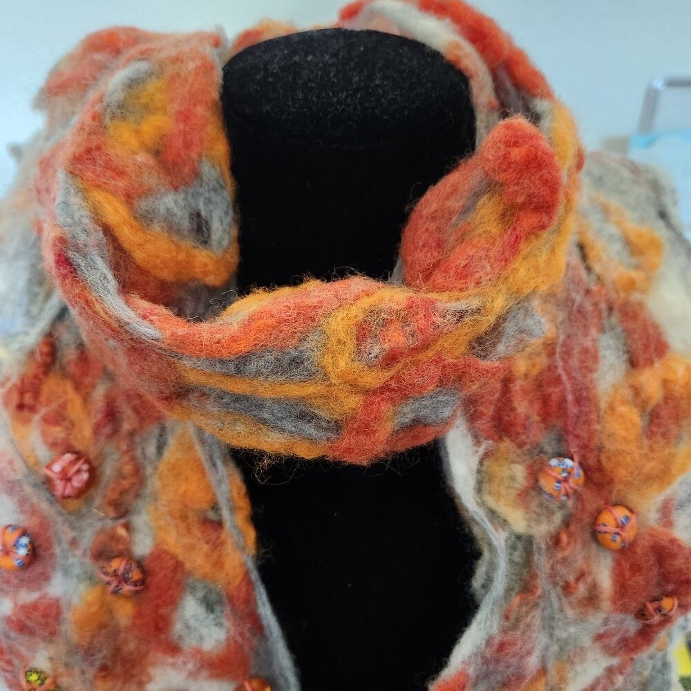 Scarf hand felted, light and soft, embellishment with ceramic beads.40 in longx4